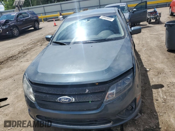 2012 Ford Fusion SEL z VIN 3FAHP0JG7CR297174, wystawiony jako Copart lot #55469005 z przebiegiem 129 434 mil mil oraz Szkoda całkowita • Salvage title. Historia ofert i sprzedaży dostępna na DreamBid. Obrazek 5.