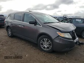 2011 Honda Odyssey EX-L with VIN 5FNRL5H65BB029311, listed as a Copart auction lot 81916724 with 184,034 mi miles and Salvage Title. Bid and sale history available at DreamBid. Image 4.
