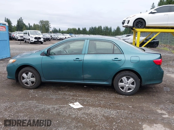 2010 Toyota Corolla with VIN 1NXBU4EE3AZ165944, listed as a IAAI auction lot 42597459 with 211,824 mi miles and . Bid and sale history available at DreamBid. Image 14.