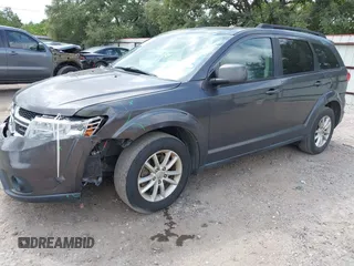 2017 Dodge Journey SXT z VIN 3C4PDCBB9HT507917, wystawiony jako IAAI lot #42322823 z przebiegiem 131 011 mil mil oraz . Historia ofert i sprzedaży dostępna na DreamBid. Obrazek 18.