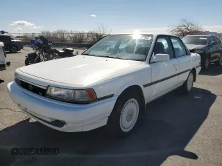 1991 Toyota Camry z VIN 4T1VV22E9MU060249, wystawiony jako Copart lot #51387785 z przebiegiem 153 405 mil mil oraz Czysty tytuł • Clean title. Historia ofert i sprzedaży dostępna na DreamBid. Obrazek 1.