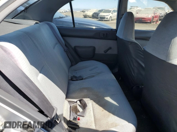 1995 Toyota Tercel DX z VIN JT2EL56E7S7011335, wystawiony jako Copart lot #67978774 z przebiegiem 182 025 mil mil oraz Szkoda całkowita • Salvage title. Historia ofert i sprzedaży dostępna na DreamBid. Obrazek 10.