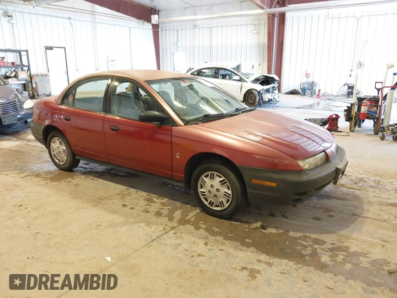 1996 Saturn SL with VIN 1G8ZG528XTZ192914, listed as a IAAI auction lot 41604499 with 126,180 mi miles. Bid and sale history available at carsss.com. Image 1.