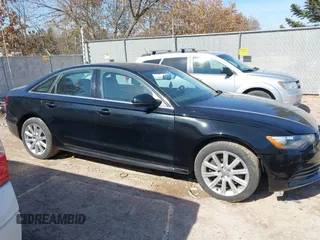 2014 Audi A6 Prestige z VIN WAUHMAFCXEN014381, wystawiony jako IAAI lot #41794551 z przebiegiem 133 649 mil mil oraz . Historia ofert i sprzedaży dostępna na DreamBid. Obrazek 13.