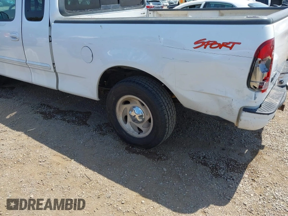 2000 Ford F-150 XL with VIN 1FTRX17L2YNA03263, listed as a IAAI auction lot 42326528 with Not provided miles and . Bid and sale history available at DreamBid. Image 17.
