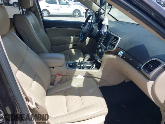 2016 Jeep Grand Cherokee Limited 75th Anniversary with VIN 1C4RJFBG0GC492720, listed as a IAAI auction lot 42073930 with 119,539 mi miles and . Bid and sale history available at DreamBid. Image 5.