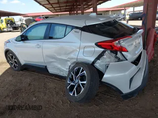 2022 Toyota C-HR XLE with VIN NMTKHMBX5NR147226, listed as a IAAI auction lot 42068867 with 21,863 mi miles. Bid and sale history available at carsss.com. Image 3.