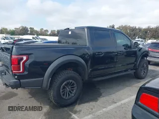 2020 Ford F-150 Raptor with VIN 1FTFW1RG2LFA30858, listed as a IAAI auction lot 42192391 with 90,018 mi miles and . Bid and sale history available at carsss.com. Image 13.