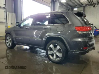 2016 Jeep Grand Cherokee Overland with VIN 1C4RJFCG9GC345309, listed as a Copart auction lot 61095285 with 115,968 mi miles and Salvage title. Bid and sale history available at DreamBid. Image 2.