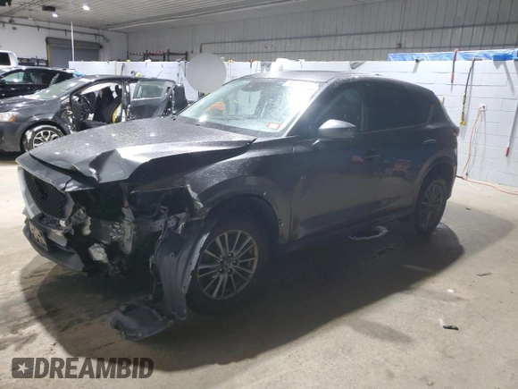 2017 Mazda CX-5 Touring with VIN JM3KFBCL9H0202976, listed as a Copart auction lot 88595355 with 68,066 mi miles and Salvage Title. Bid and sale history available at carsss.com. Image 1.