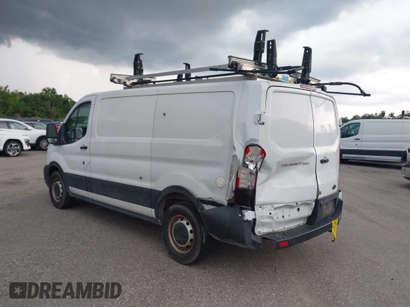 2020 Ford Transit Cargo with VIN 1FTBR1Y8XLKA19646, listed as a IAAI auction lot 42633323 with 82,577 mi miles and . Bid and sale history available at DreamBid. Image 3.