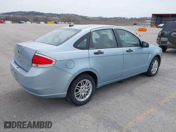 2009 Ford Focus SE with VIN 1FAHP35N59W157060, listed as a IAAI auction lot 41871757 with 141,558 mi miles. Bid and sale history available at carsss.com. Image 4.