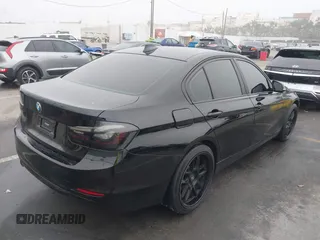 2014 BMW 3 Series 320i with VIN WBA3B1C59EK130839, listed as a IAAI auction lot 41225364 with 131,312 mi miles. Bid and sale history available at carsss.com. Image 4.
