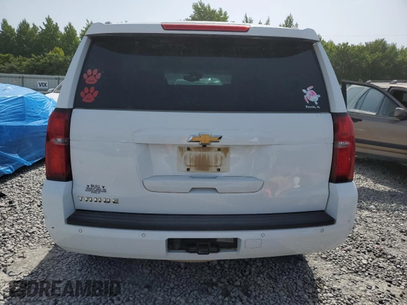 2018 Chevrolet Tahoe LT z VIN 1GNSCBKC4JR341974, wystawiony jako Copart lot #65204594 z przebiegiem 136 913 mil mil oraz Szkoda całkowita • Salvage title. Historia ofert i sprzedaży dostępna na DreamBid. Obrazek 6.