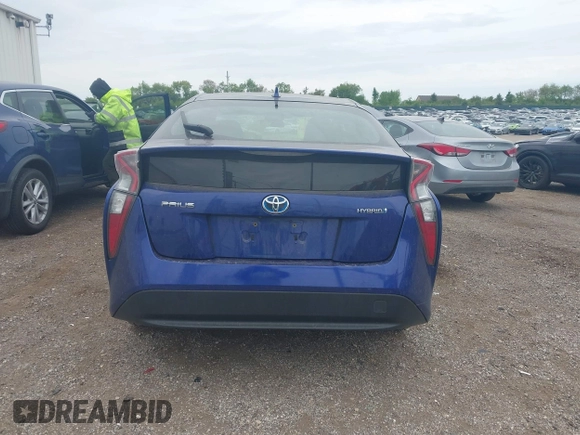 2016 Toyota Prius Two z VIN JTDKBRFU3G3511809, wystawiony jako IAAI lot #42295946 z przebiegiem 118 621 mil mil oraz . Historia ofert i sprzedaży dostępna na DreamBid. Obrazek 16.