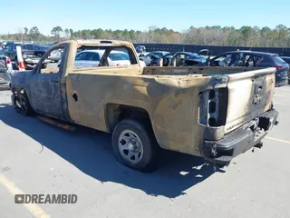 2014 Chevrolet Silverado 1500 Work Truck with VIN 1GCNCPEH0EZ272958, listed as a IAAI auction lot 41801400 with 130,363 mi miles and . Bid and sale history available at DreamBid. Image 3.