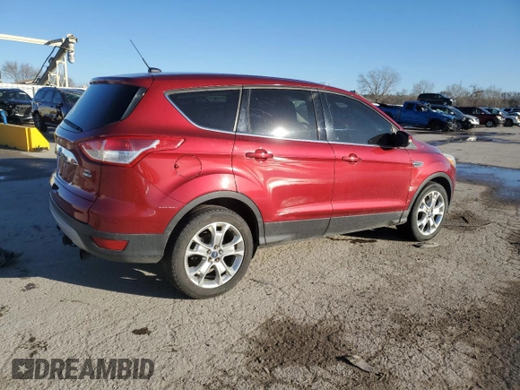 2013 Ford Escape SEL with VIN 1FMCU9H9XDUA48561, listed as a Copart auction lot 47809485 with 310,598 mi miles and Salvage Title. Bid and sale history available at DreamBid. Image 3.