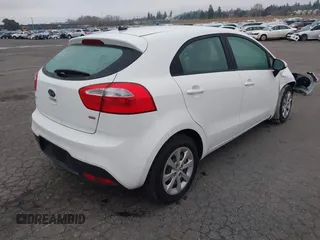 2013 Kia Rio LX with VIN KNADM5A34D6110013, listed as a IAAI auction lot 41306019 with 80,501 mi miles and . Bid and sale history available at DreamBid. Image 4.