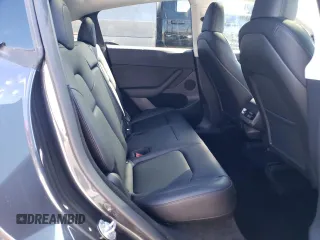 2024 Tesla Model Y with VIN 7SAYGDED3RF114643, listed as a Copart auction lot 56557075 with 3,021 mi miles and Salvage Title. Bid and sale history available at DreamBid. Image 10.