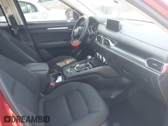 2020 Mazda CX-5 Sport with VIN JM3KFABM7L1819493, listed as a IAAI auction lot 41304240 with 52,940 mi miles. Bid and sale history available at carsss.com. Image 5.