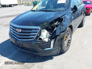 2017 Cadillac XT5 Luxury AWD z VIN 1GYKNDRS6HZ325727, wystawiony jako IAAI lot #41900538 z przebiegiem 132 375 mil mil oraz . Historia ofert i sprzedaży dostępna na DreamBid. Obrazek 6.