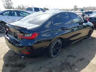 2023 BMW 3 Series 330i with VIN 3MW69FF03P8D45563, listed as a IAAI auction lot 41932536 with 19,496 mi miles and . Bid and sale history available at DreamBid. Image 4.