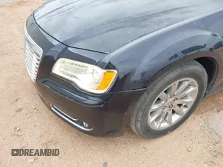 2012 Chrysler 300 Limited with VIN 2C3CCACG7CH138299, listed as a IAAI auction lot 41807036 with 146,322 mi miles and . Bid and sale history available at DreamBid. Image 6.