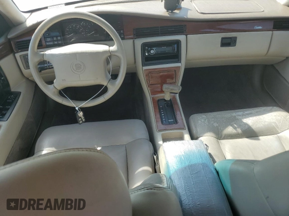 1995 Cadillac Seville Luxury SLS z VIN 1G6KS52Y8SU812826, wystawiony jako Copart lot #75322984 z przebiegiem Nie podano mil oraz Szkoda całkowita • Salvage title. Historia ofert i sprzedaży dostępna na DreamBid. Obrazek 8.