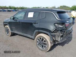 2020 Jeep Compass Trailhawk z VIN 3C4NJDDB7LT195317, wystawiony jako IAAI lot #42325122 z przebiegiem 97 858 mil mil oraz . Historia ofert i sprzedaży dostępna na DreamBid. Obrazek 3.