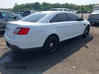 2014 Ford Police Interceptor with VIN 1FAHP2MKXEG100925, listed as a IAAI auction lot 42491379 with 97,937 mi miles and . Bid and sale history available at DreamBid. Image 4.