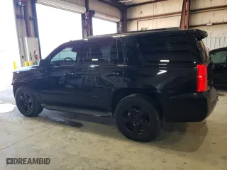 2015 Chevrolet Tahoe LTZ with VIN 1GNSKCKC4FR115935, listed as a Copart auction lot 89364335 with 132,666 mi miles and Salvage Title. Bid and sale history available at carsss.com. Image 2.
