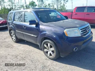 2014 Honda Pilot Touring with VIN 5FNYF4H92EB019248, listed as a IAAI auction lot 41942963 with 136,183 mi miles and . Bid and sale history available at carsss.com. Image 1.