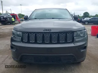 2018 Jeep Grand Cherokee Altitude z VIN 1C4RJFAGXJC190814, wystawiony jako IAAI lot #42660901 z przebiegiem 127 632 mil mil oraz . Historia ofert i sprzedaży dostępna na DreamBid. Obrazek 12.