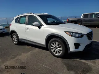 2016 Mazda CX-5 Sport с VIN JM3KE2BY0G0874729, выставлен на аукционе Copart как лот 45242795 с пробегом 70 741 миль миль и Чистый • Clean title. История ставок и продаж доступна на DreamBid. Изображение 4.