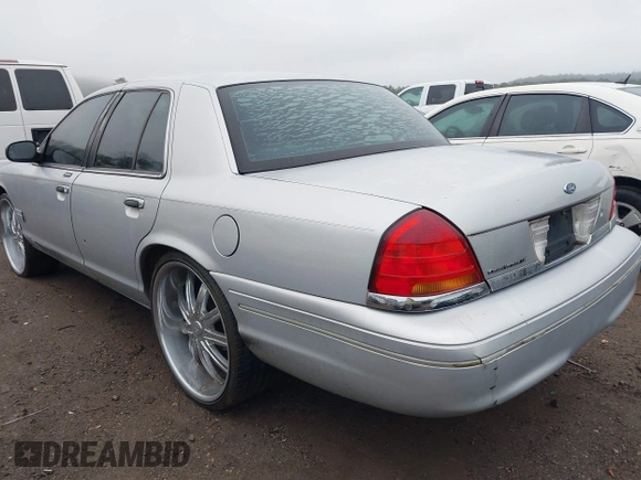 2001 Ford Crown Victoria LX с VIN 2FAFP74W21X143151, выставлен на аукционе IAAI как лот 41471923 с пробегом 207 583 миль миль и . История ставок и продаж доступна на DreamBid. Изображение 3.