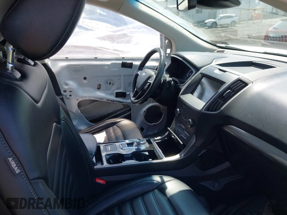 2020 Ford Edge SEL z VIN 2FMPK4J95LBA31157, wystawiony jako IAAI lot #42225863 z przebiegiem 96 082 mil mil oraz . Historia ofert i sprzedaży dostępna na DreamBid. Obrazek 5.