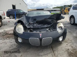 2006 Pontiac Solstice z VIN 1G2MB33B96Y101269, wystawiony jako Copart lot #70323934 z przebiegiem 85 038 mil mil oraz Szkoda całkowita • Salvage title. Historia ofert i sprzedaży dostępna na DreamBid. Obrazek 5.