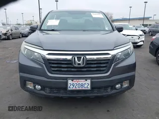2017 Honda Ridgeline RTL-T with VIN 5FPYK2F67HB002854, listed as a IAAI auction lot 41895895 with 86,882 mi miles and . Bid and sale history available at DreamBid. Image 13.