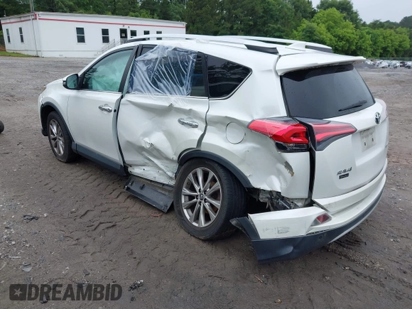 2016 Toyota RAV4 Limited with VIN 2T3YFREV6GW293418, listed as a IAAI auction lot 42367428 with 210,000 mi miles and . Bid and sale history available at DreamBid. Image 3.