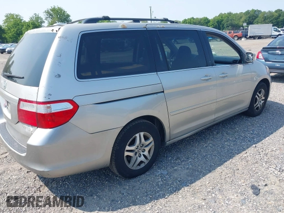 2005 Honda Odyssey EX-L z VIN 5FNRL38785B036142, wystawiony jako IAAI lot #42422595 z przebiegiem 190 083 mil mil oraz . Historia ofert i sprzedaży dostępna na DreamBid. Obrazek 4.