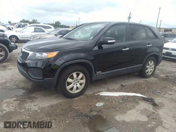 2012 Kia Sorento LX with VIN 5XYKTCA61CG272964, listed as a IAAI auction lot 42210384 with 181,948 mi miles and . Bid and sale history available at DreamBid. Image 2.
