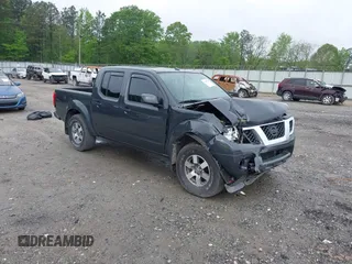 2013 Nissan Frontier SV z VIN 1N6AD0EV7DN761871, wystawiony jako IAAI lot #42073290 z przebiegiem 150 412 mil mil oraz . Historia ofert i sprzedaży dostępna na DreamBid. Obrazek 1.