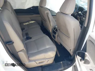 2021 Honda Pilot Touring 8-Passenger z VIN 5FNYF6H94MB087593, wystawiony jako IAAI lot #42153310 z przebiegiem 30 400 mil mil oraz . Historia ofert i sprzedaży dostępna na DreamBid. Obrazek 8.