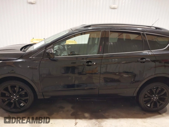 2017 Ford Escape SE with VIN 1FMCU9GD8HUF04133, listed as a IAAI auction lot 41390354 with 93,139 mi miles. Bid and sale history available at carsss.com. Image 14.