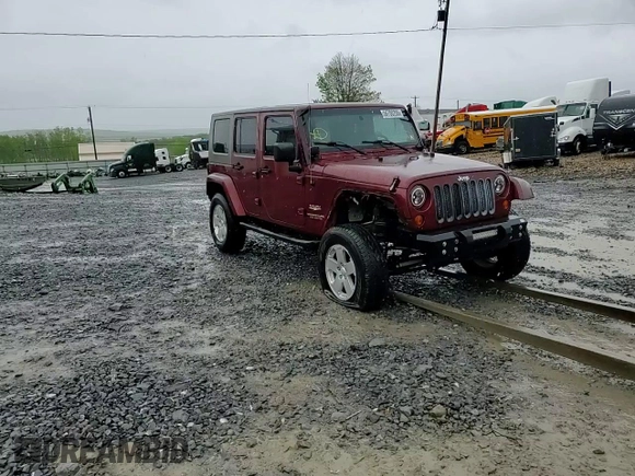 2007 Jeep Wrangler Unlimited Sahara with VIN 1J4GA59197L104784, listed as a Copart auction lot 56700205 with 156,382 mi miles and Salvage title. Bid and sale history available at DreamBid. Image 15.