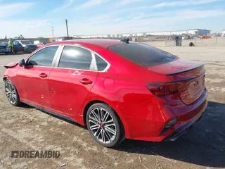 2023 Kia Forte GT with VIN 3KPF44ACXPE563556, listed as a IAAI auction lot 41324243 with 35,872 mi miles and . Bid and sale history available at carsss.com. Image 3.