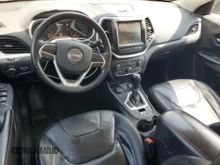 2014 Jeep Cherokee Trailhawk with VIN 1C4PJMBS1EW242527, listed as a Copart auction lot 53160485 with 104,074 mi miles and Salvage Title. Bid and sale history available at carsss.com. Image 8.