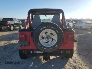 1991 Jeep Wrangler z VIN 2J4FY19P6MJ107521, wystawiony jako Copart lot #84077214 z przebiegiem 1 311 216 mil mil oraz Czysty tytuł • Clean title. Historia ofert i sprzedaży dostępna na DreamBid. Obrazek 6.