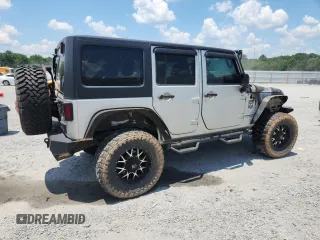 2007 Jeep Wrangler Unlimited Sahara с VIN 1J4GA59167L183198, выставлен на аукционе Copart как лот 62135995 с пробегом Не указан миль и Списание • Salvage title. История ставок и продаж доступна на DreamBid. Изображение 3.