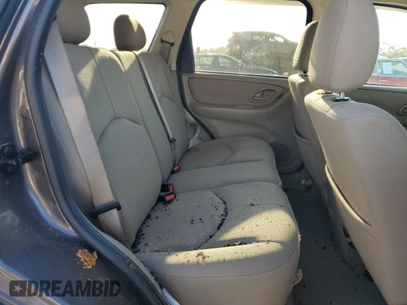 2006 Mazda Tribute S with VIN 4F2YZ04116KM23873, listed as a Copart auction lot 79926084 with 67,142 mi miles and Salvage Title. Bid and sale history available at DreamBid. Image 11.